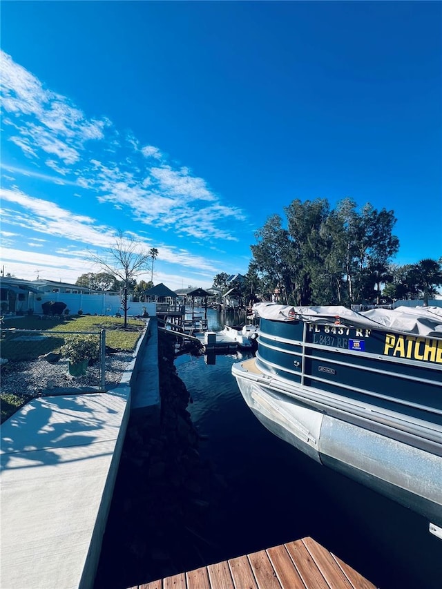 dock area featuring a water view