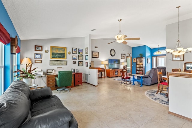 living room with vaulted ceiling and ceiling fan