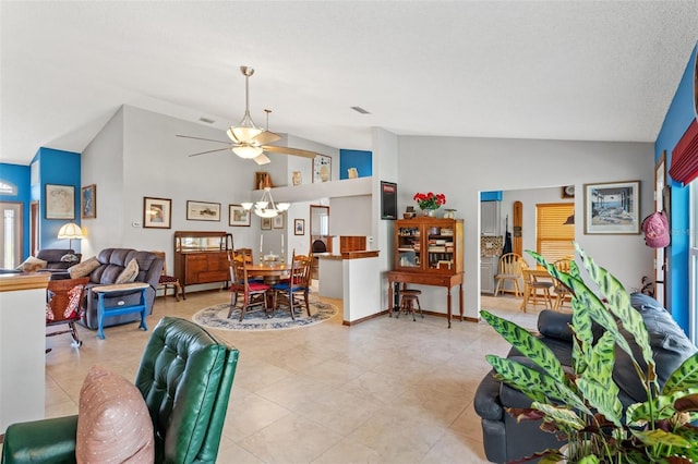 living room with high vaulted ceiling, a textured ceiling, and ceiling fan