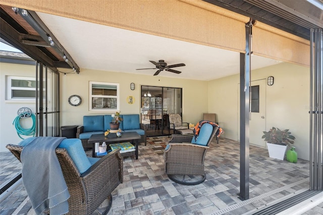 view of patio / terrace featuring an outdoor living space and ceiling fan