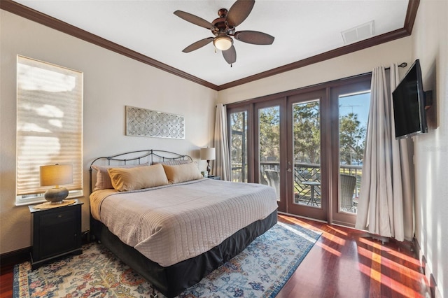 bedroom featuring hardwood / wood-style flooring, access to outside, ornamental molding, and ceiling fan