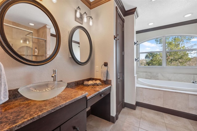 bathroom with crown molding, a textured ceiling, vanity, independent shower and bath, and tile patterned flooring