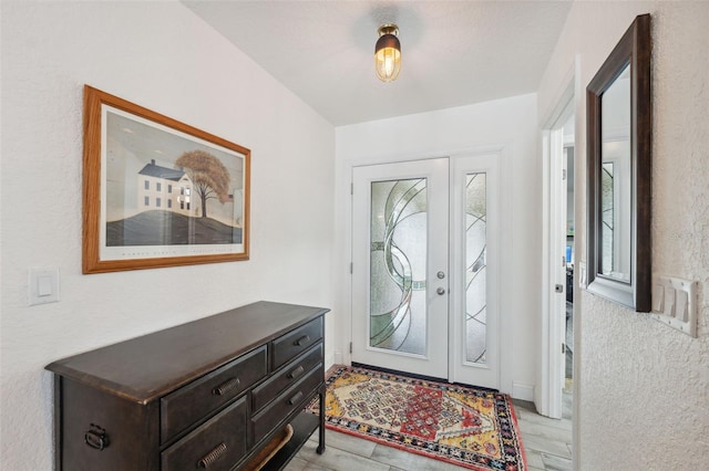 entrance foyer with light hardwood / wood-style floors