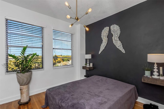 bedroom featuring hardwood / wood-style flooring