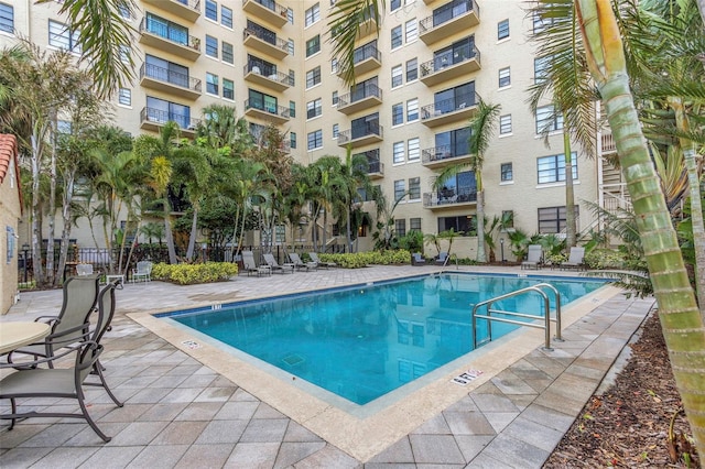 view of pool featuring a patio area