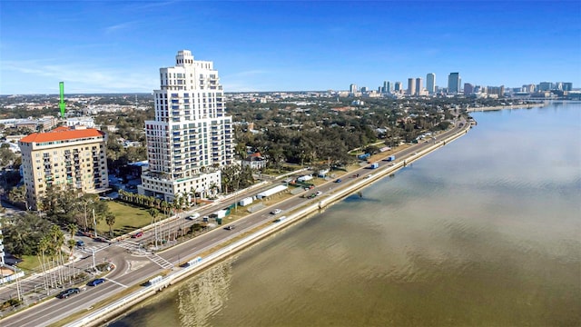 drone / aerial view with a water view