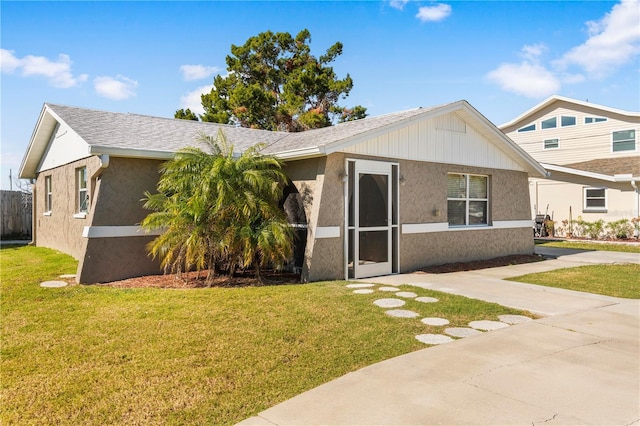 view of front of home with a front yard