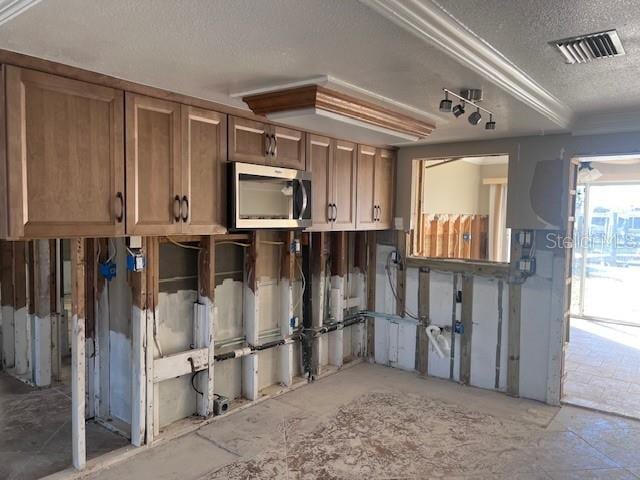 kitchen featuring a textured ceiling