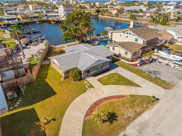 bird's eye view with a water view