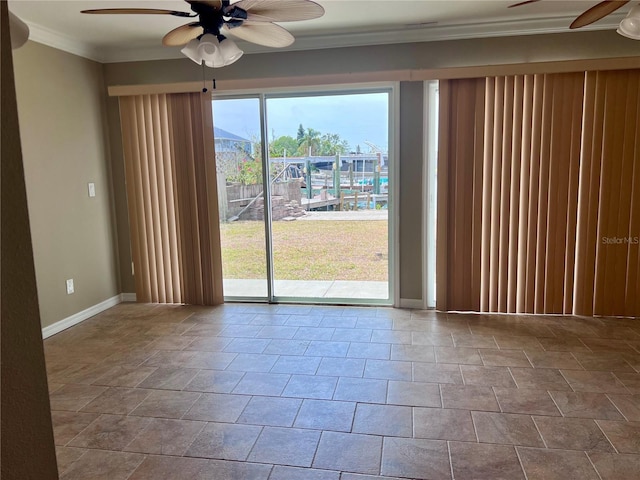 13637 Lagoon Dr, Hudson, FL 34667 - unfurnished room with crown molding, baseboards, and ceiling fan