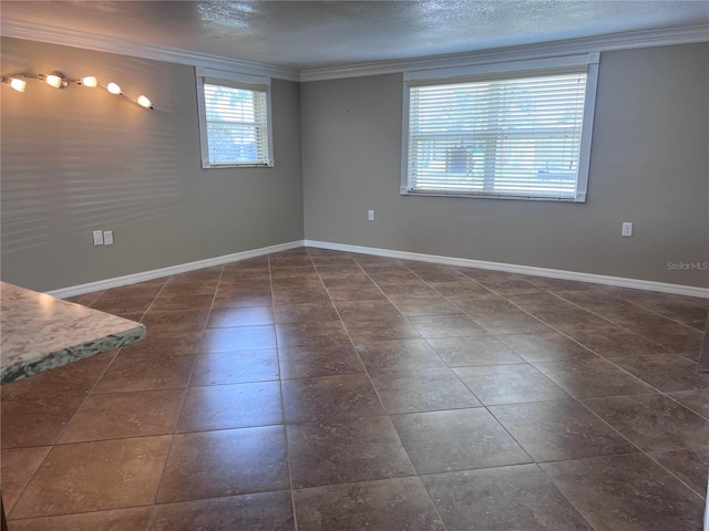 13637 Lagoon Dr, Hudson, FL 34667 - interior space with crown molding, a textured ceiling, and baseboards