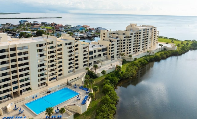 birds eye view of property featuring a water view