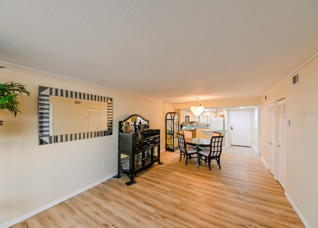 dining area featuring light hardwood / wood-style flooring