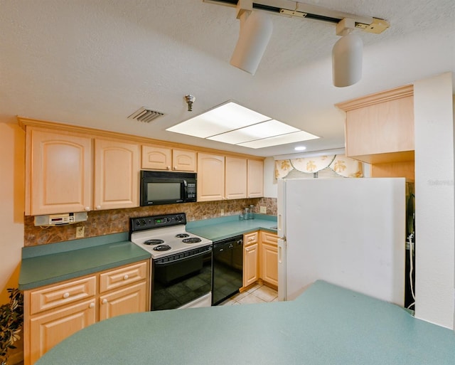 kitchen with light tile patterned floors, a textured ceiling, light brown cabinetry, and black appliances