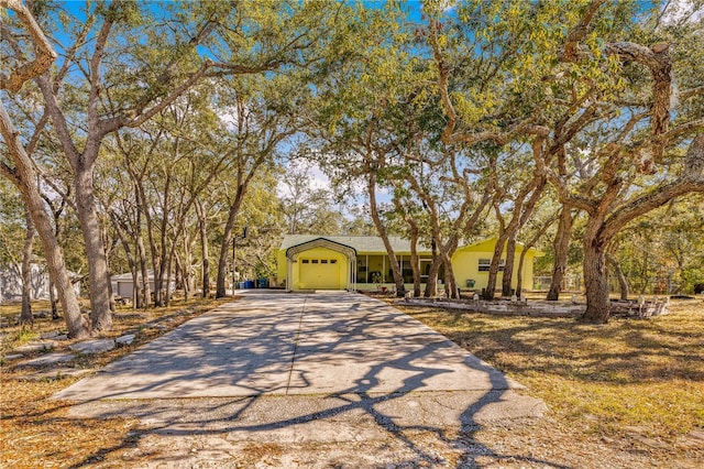 view of front of home with a garage