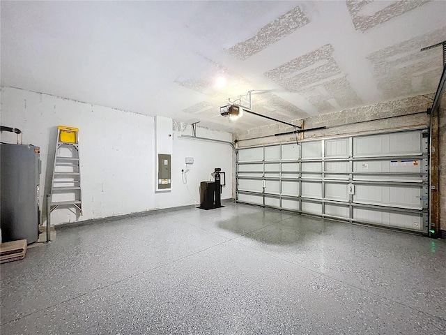 garage featuring a garage door opener, electric panel, and electric water heater