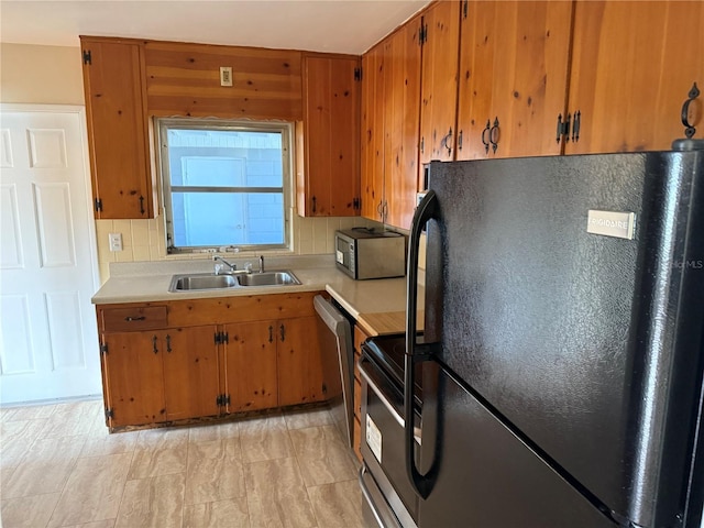 kitchen featuring sink and stainless steel appliances