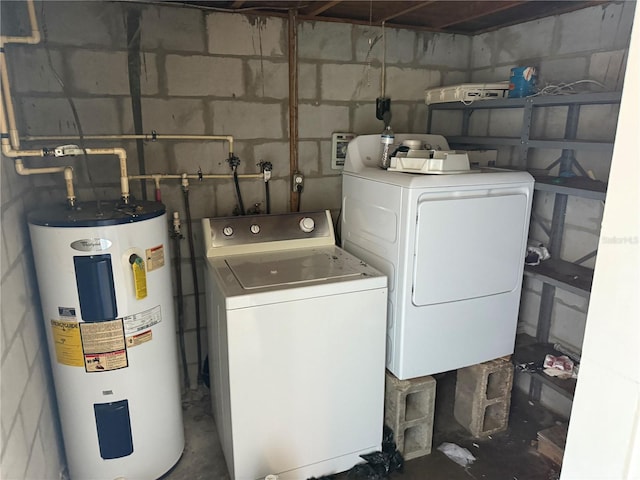 clothes washing area with washing machine and clothes dryer and water heater