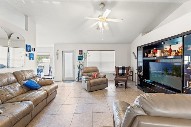 tiled living room featuring vaulted ceiling and ceiling fan