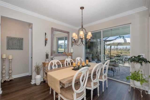 dining area featuring dark hardwood / wood-style flooring, a wealth of natural light, and ornamental molding