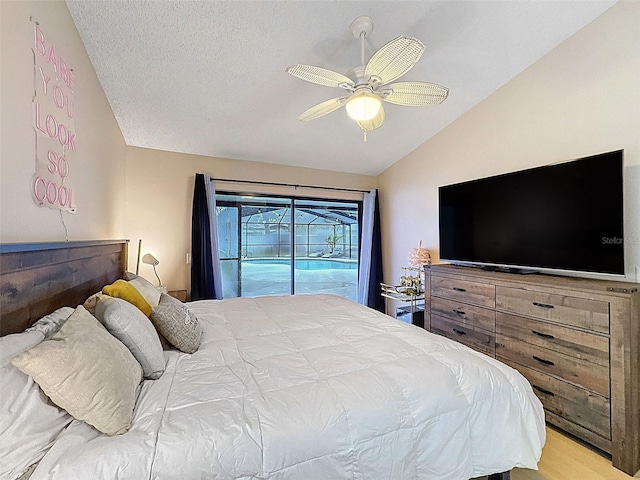 bedroom with a ceiling fan, access to outside, a textured ceiling, light wood-style floors, and vaulted ceiling