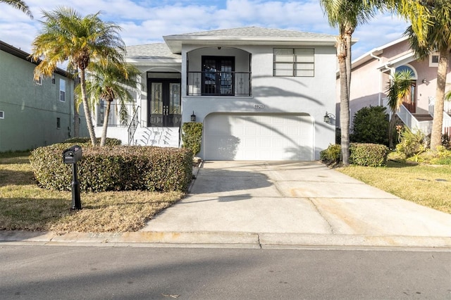 view of front of property with a garage