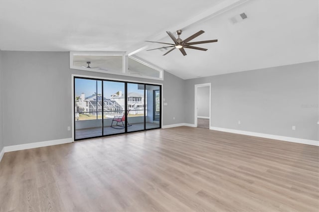 5925 Seaside Dr, New Port Richey, FL 34652 - unfurnished living room featuring ceiling fan, light hardwood / wood-style flooring, and vaulted ceiling with beams