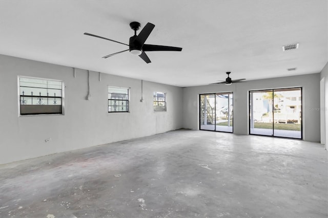5925 Seaside Dr, New Port Richey, FL 34652 - unfurnished room featuring concrete floors