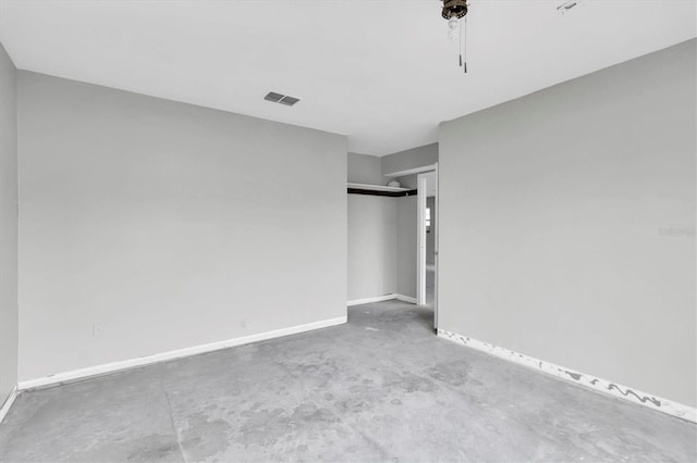 5925 Seaside Dr, New Port Richey, FL 34652 - unfurnished bedroom featuring concrete flooring