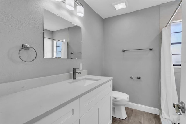 5925 Seaside Dr, New Port Richey, FL 34652 - bathroom featuring vanity and toilet