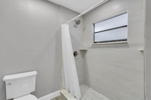 5925 Seaside Dr, New Port Richey, FL 34652 - bathroom featuring a shower with curtain and toilet