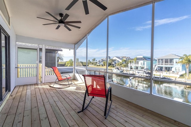 5925 Seaside Dr, New Port Richey, FL 34652 - sunroom with a water view and ceiling fan