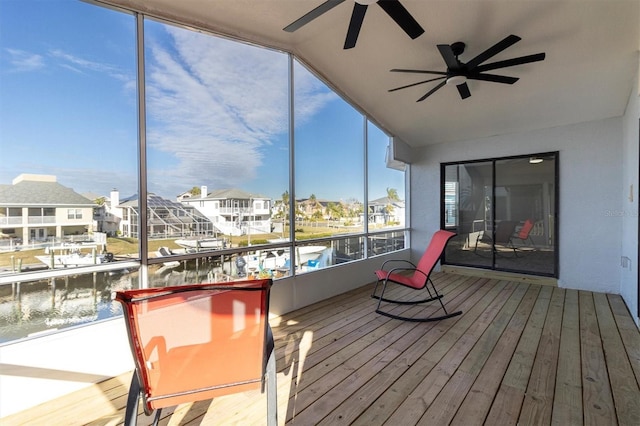 5925 Seaside Dr, New Port Richey, FL 34652 - sunroom / solarium with a water view and vaulted ceiling