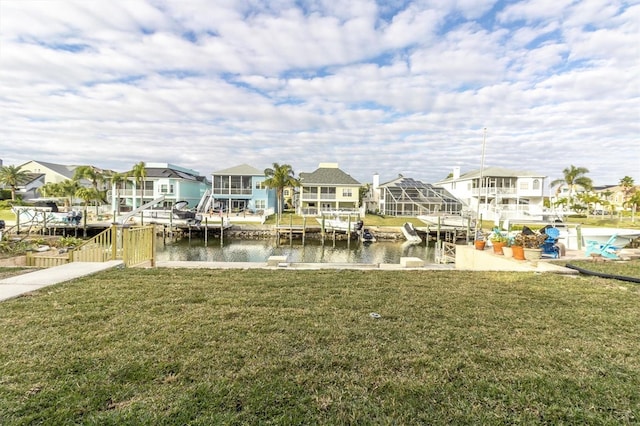 5925 Seaside Dr, New Port Richey, FL 34652 - view of dock with a water view and a lawn