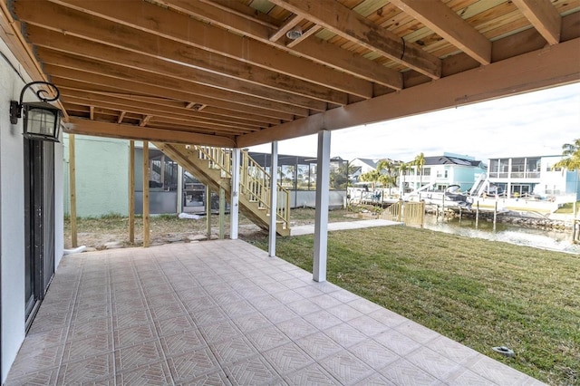 5925 Seaside Dr, New Port Richey, FL 34652 - view of patio with a water view