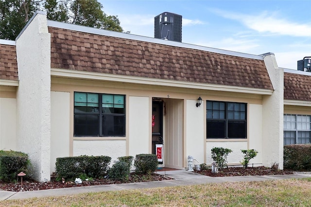 exterior space featuring central air condition unit