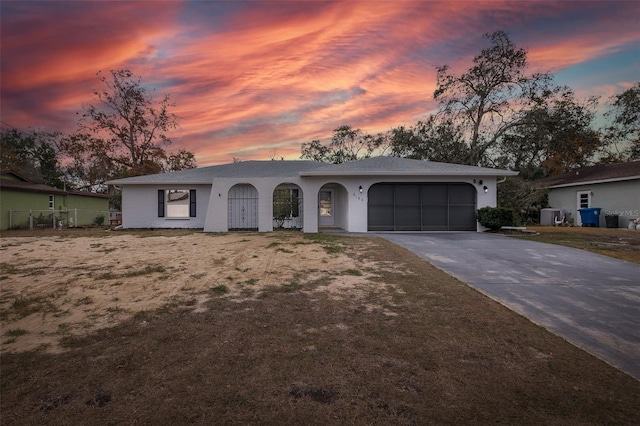 single story home featuring a yard and cooling unit