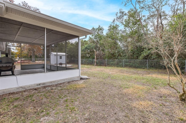 view of yard with a sunroom