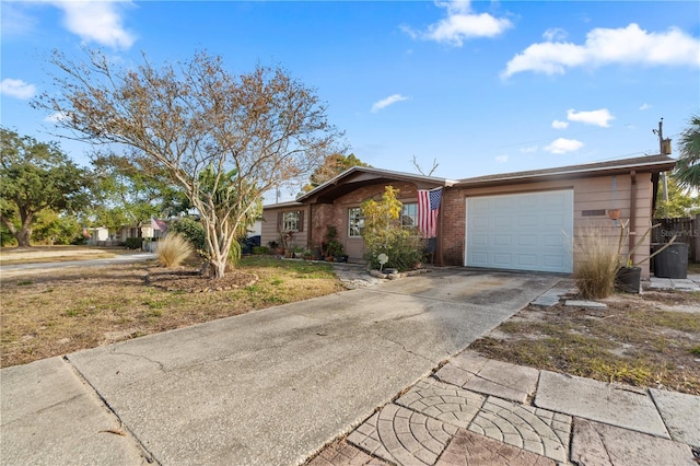 single story home featuring a garage