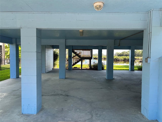 garage featuring a water view