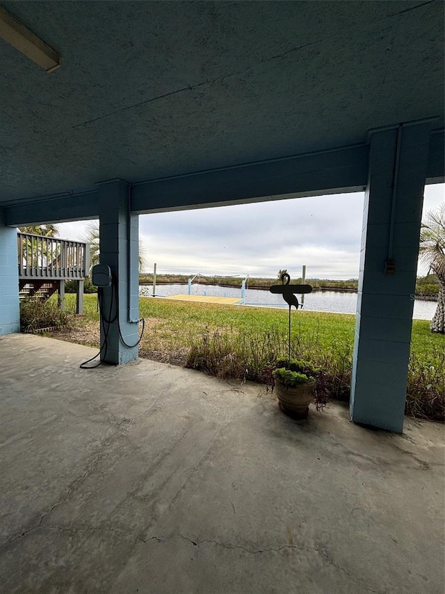 view of patio / terrace with a water view