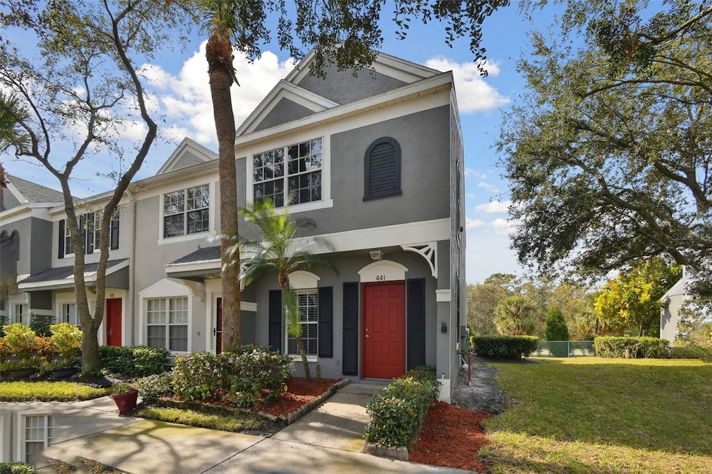 view of front of home with a front yard