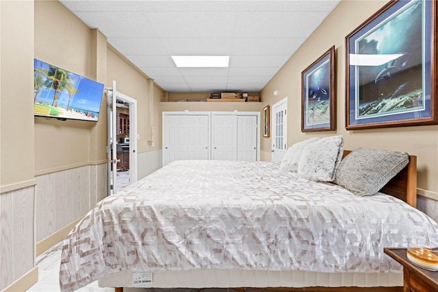 bedroom featuring a paneled ceiling