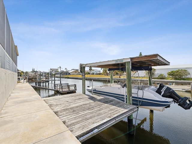 dock area featuring a water view