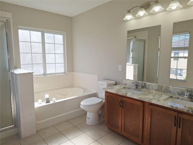 full bathroom with shower with separate bathtub, vanity, tile patterned floors, and toilet