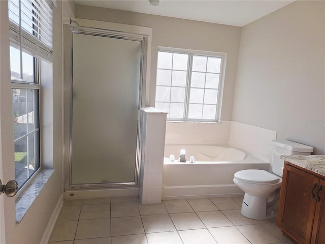 full bathroom featuring shower with separate bathtub, a healthy amount of sunlight, vanity, and toilet