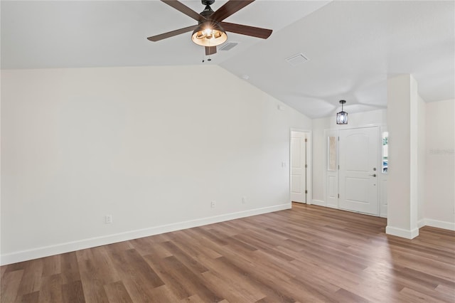 interior space featuring hardwood / wood-style flooring, vaulted ceiling, and ceiling fan