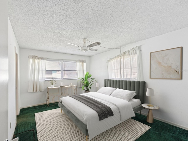 carpeted bedroom with a textured ceiling and ceiling fan