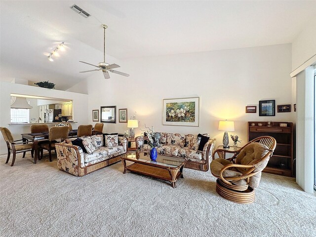 1203 Clays Trl Unit 406, Oldsmar, FL 34677 - living room featuring carpet floors, visible vents, high vaulted ceiling, and a ceiling fan
