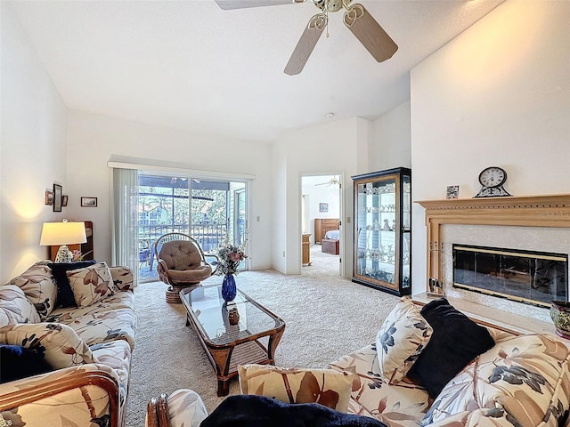 1203 Clays Trl Unit 406, Oldsmar, FL 34677 - living room featuring ceiling fan, carpet, and a glass covered fireplace